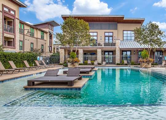Resort-inspired swimming pool at Twin Creeks Crossing, apartments in Allen, TX