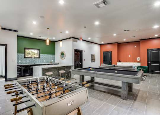 Game room with billiards and foosball at The Lana , North Dallas apartments for rent