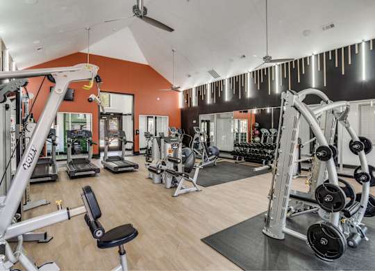 Fitness center with cardio and strength equipment at The Lana, luxury apartments in North Dallas