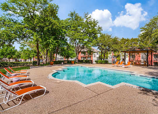 Landscaped pool area at The Lana, Dallas apartments
