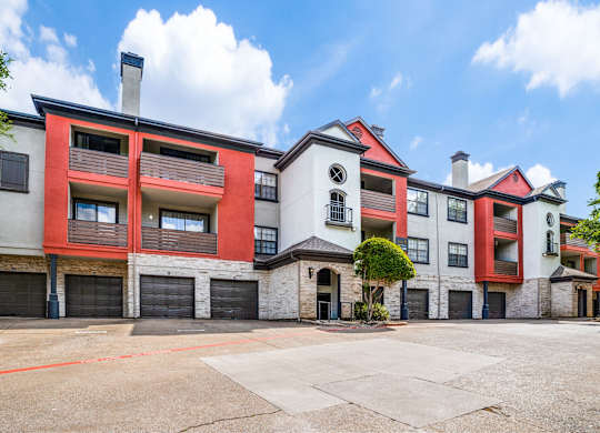 Exterior of The Lana, apartments in Dallas, TX with private garages and balconies