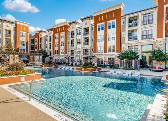 Resort-inspired swimming pool at The Carson at Twin Creeks, Allen apartments