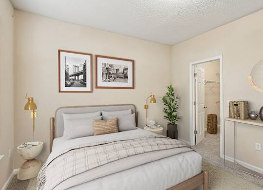 A bedroom with a bed, nightstand, and a lamp.