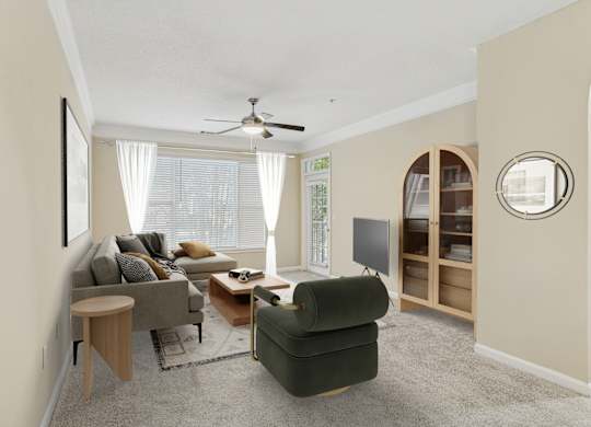 A living room with a grey couch, a green armchair, a wooden side table, and a television.
