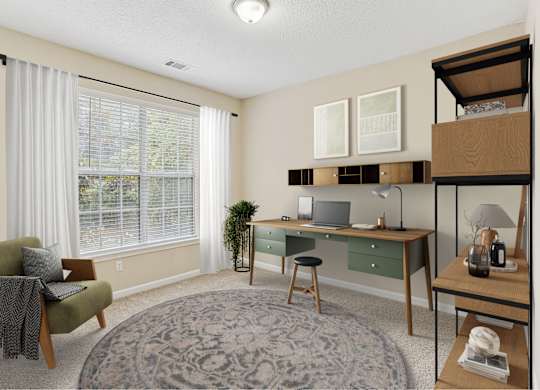 A room with a desk, chair, and a window with blinds.