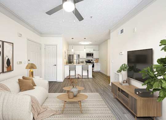 A living room with a white couch and a wooden coffee table.