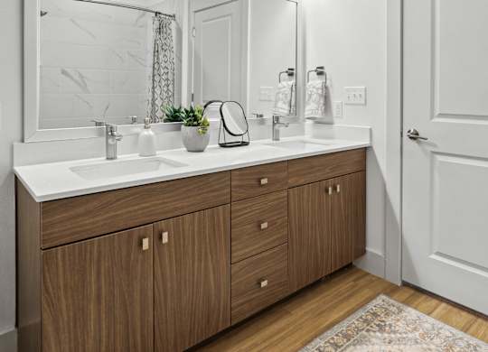 a bathroom with a large mirror and a sink