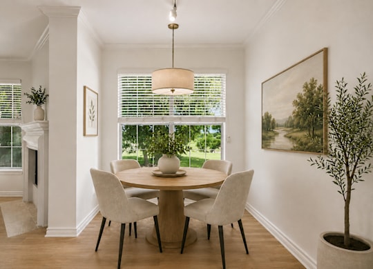 A dining room with a table at St Moritz in Dallas Texas