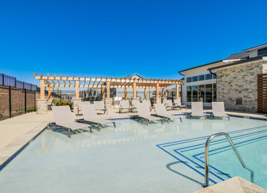 Resort-Style Pool Deck with Lounge Area & Grilling Station