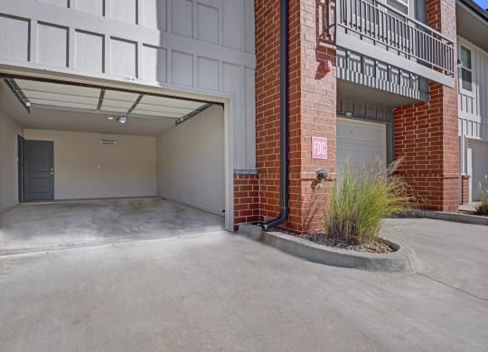the entrance to a building with an empty parking garage