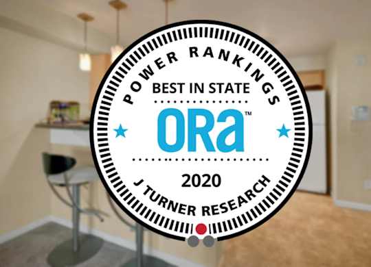 A room with a round badge that says