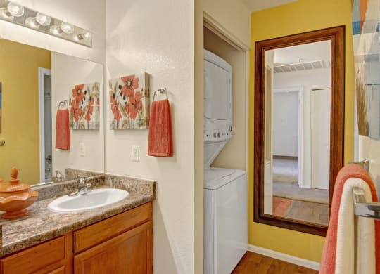 Bathroom with washer and dryer
