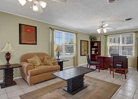 a living room with a couch and a table