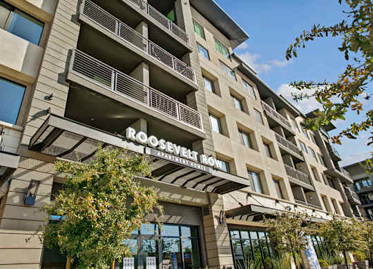 A building with the name "Brookfield Apartments" on it.