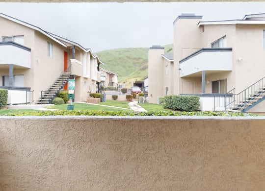 a view of the outside of an apartment complex