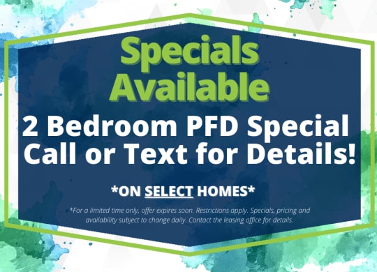 a blue sign with a green border and the words 2 bedroom pfd special call or text