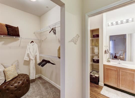 Residence at North Penn walk in closet with lush carpet