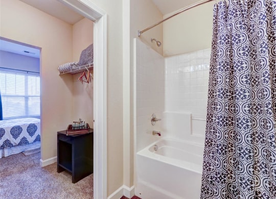 Residence at North Penn large bathroom with walk in closet attached