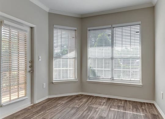 Sycamore Farms_ Livingroom with tall windows and hardwood floors _Weidner