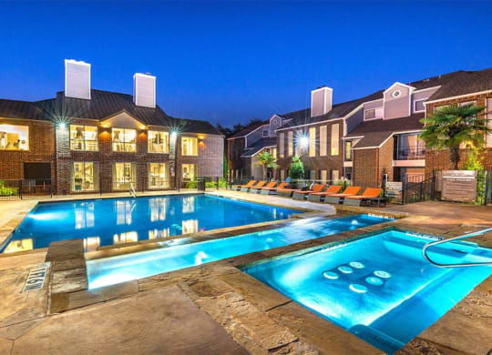 Lakewood on the Trail outdoor pool view with lounge chairs Apartment near DFW