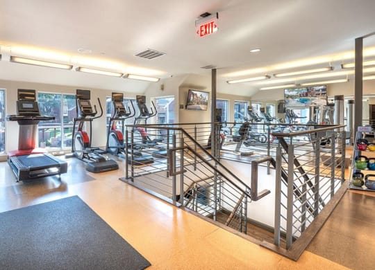 Lakewood on the Trail fitness room with great lighting Apartments with indoor gym in Dallas, TX