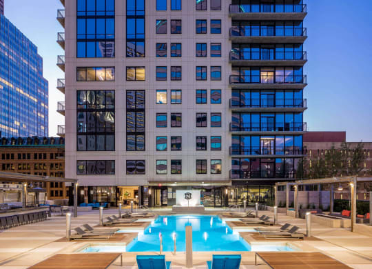 Nic on 5th Apartments in Minneapolis, Minnesota- Exterior view of outdoor recreation area and pool
