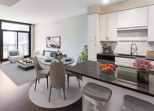 Nic on 5th Apartments in Minneapolis, Minnesota- Large furnished kitchen and living room with wooden floors and tall windows