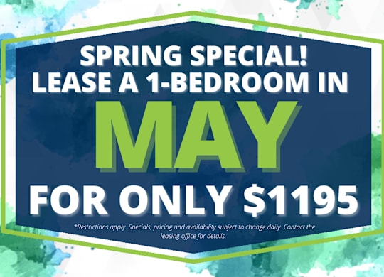 A sign advertises a special offer to lease a 1-bedroom apartment in May for only $1195.