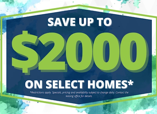 A promotional image advertising savings of up to $2000 on select homes.