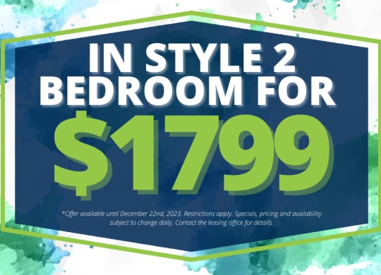 a blue and green sign that reads in style 2 bedroom for 699