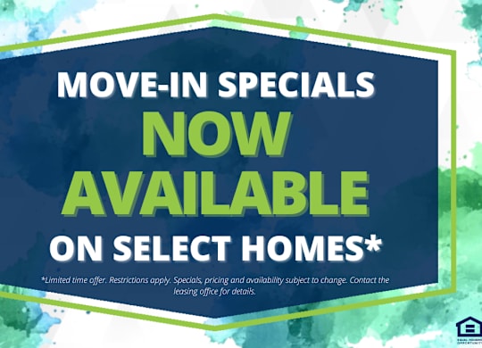 A sign advertising move-in specials on select homes.