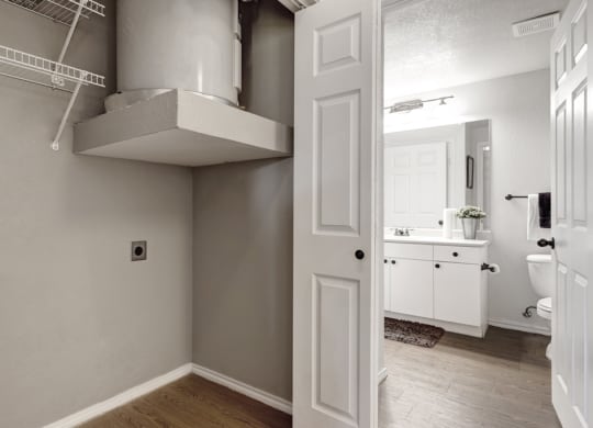 a bathroom with a sink and a toilet in a house
