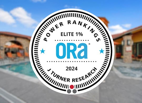 A badge with the text "POWER RANKINGS ELITE 1%" and "ORA 2024" is displayed in front of a poolside scene.