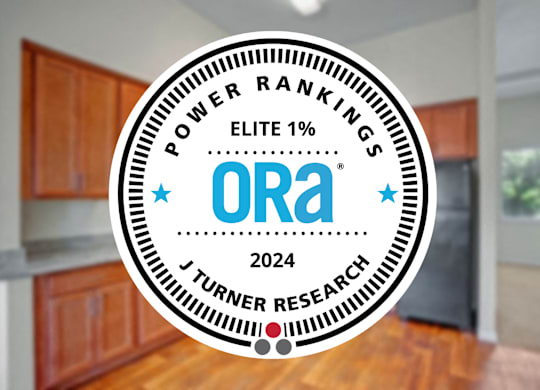 A badge with the text "POWER RANKINGS ELITE 1%" and "ORA 2024 J TURNER RESEARCH" on it.