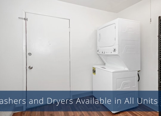 A small laundry room here at The Glen Apartments with a white stacked washer and dryer on the right, a closed white door on the left, and wood-patterned flooring. Bright and functional.