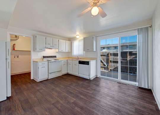 Yorkshire Square Open Kitchen With Hardwood Floors Apartments in Colorado Springs, CO