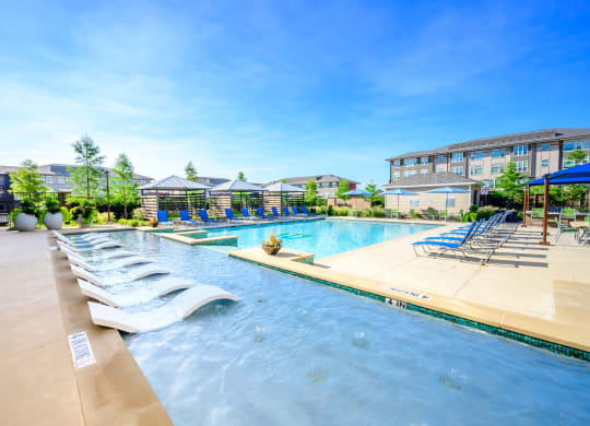 Harmony Luxury Apartments pool and entertainment area Apartments for rent Rowlett, TX 75089