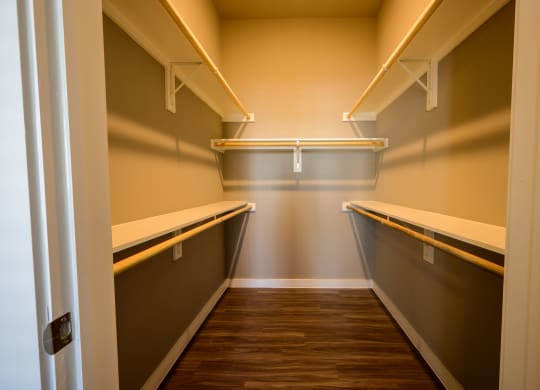 Harmony Luxury Apartments walk in closet with tall ceilings