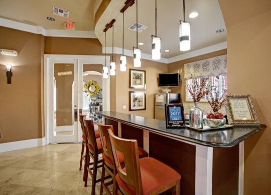 The Palms at Briarwood Resident Lounge Fireplace Apartment near Odessa, TX