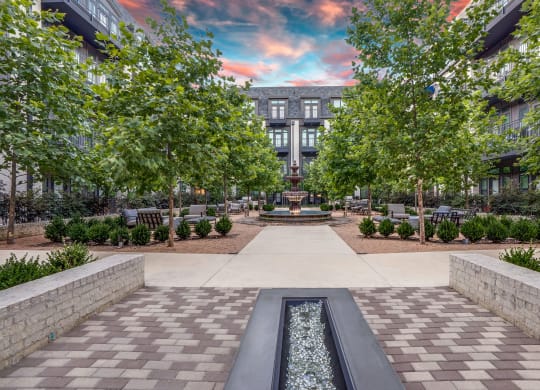 The Crosby at The Brickyard outdoor seating area Apartments in Farmers Branch, TX