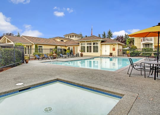 Lakeside outdoor pool and wading pool, Dean Weidner Real Estate Investments Apartments in Mountlake Terrace, WA