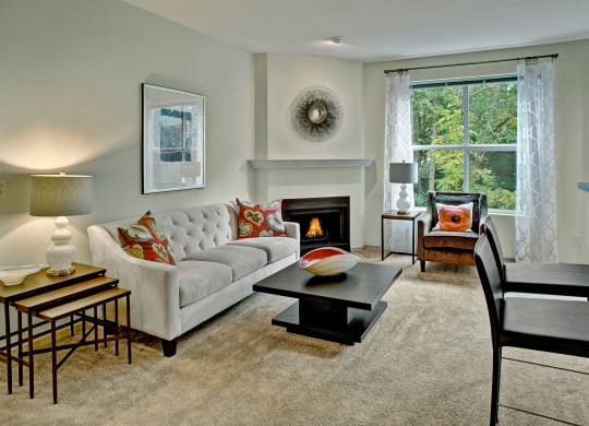 Portsmith Living Room with Fireplace Apartments in Everett, WA