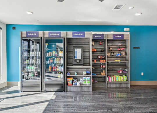 A store with a blue wall and a sign that says "refuel" on it.