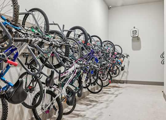 A room full of bicycles is shown.