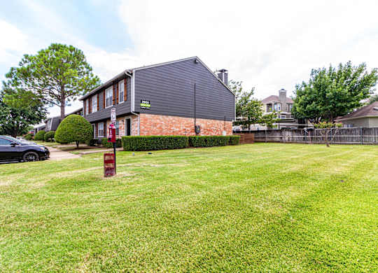 a large lawn in front of a house
