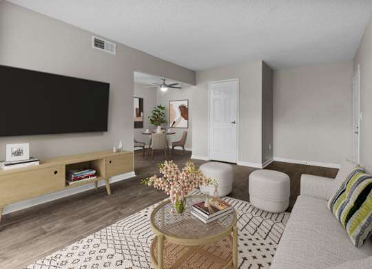 a living room with a couch and a table