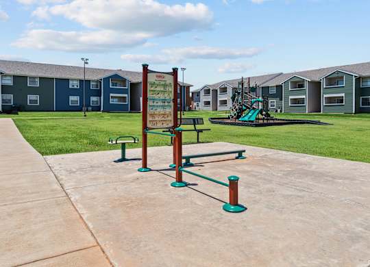 a playground at the whispering winds apartments in pearland, tx