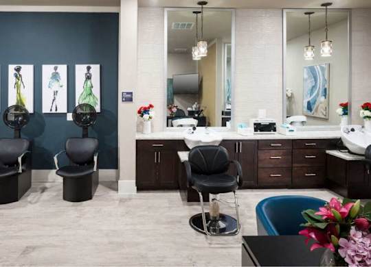 a room with a table and chairs and a mirror