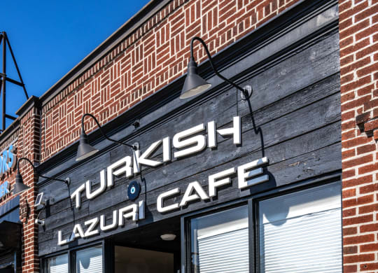 Turkish Cafe with tables and chairs outside, Allston, MA