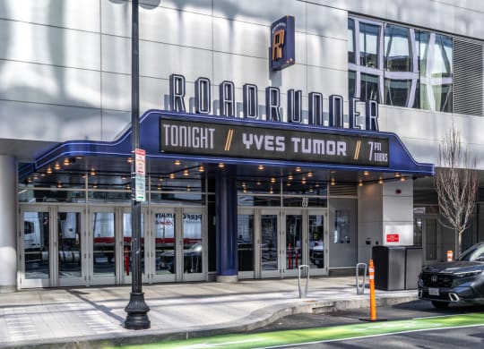 the front of a building with a sign that reads tower vews tunnel 1
